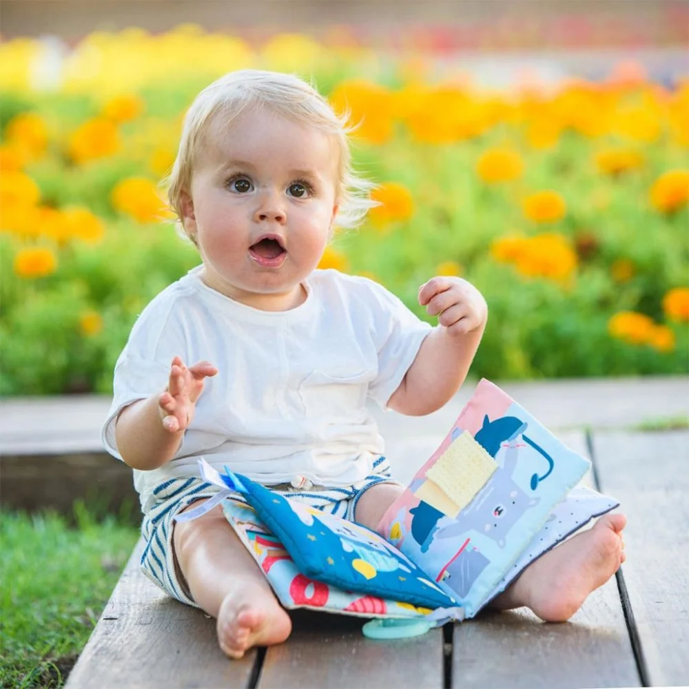 Розвиваюча іграшка Taf Toys книжка для візочка - Що вдягне ведмедик Пол (12605) — фото 7
